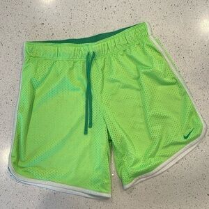Nike athletic shorts in bright green size youth large